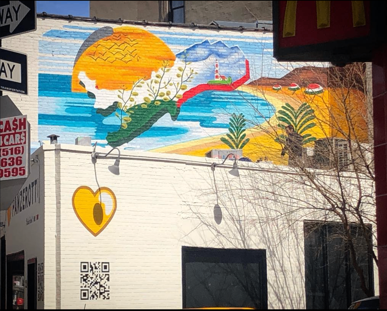 Murale Puglia–New York dipinto sulla parete dello store